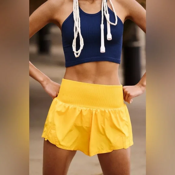 Free People Movement Carpe Diem Shorts in Yellow. - Picture 4 of 6